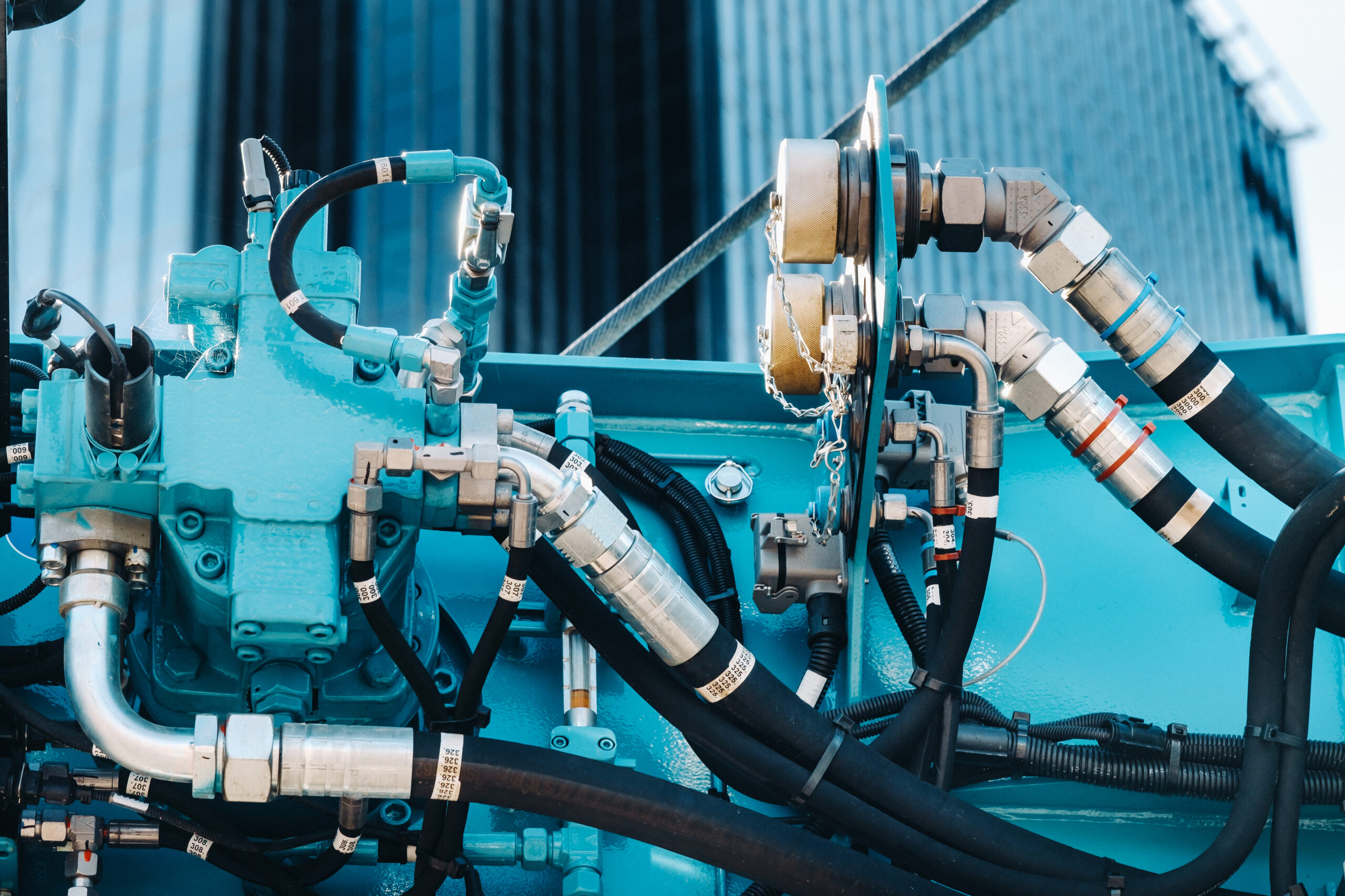 Hydraulic hoses and fittings on a crane control system